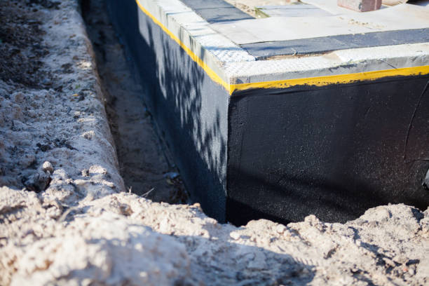 Professional Waterproofing technician working in Greenville, OH
